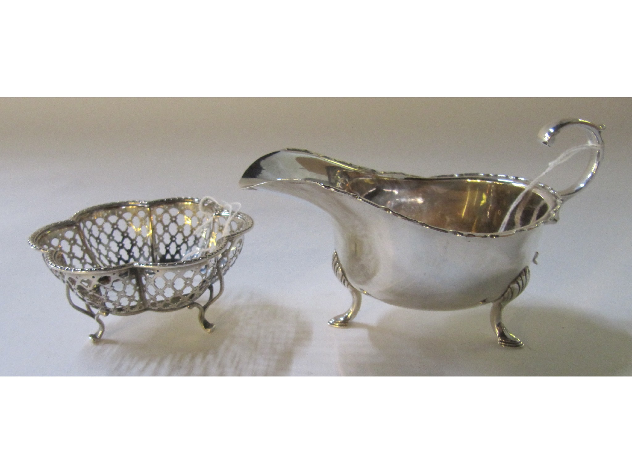 Appraisal: A lot comprising a silver sauceboat and a silver bon