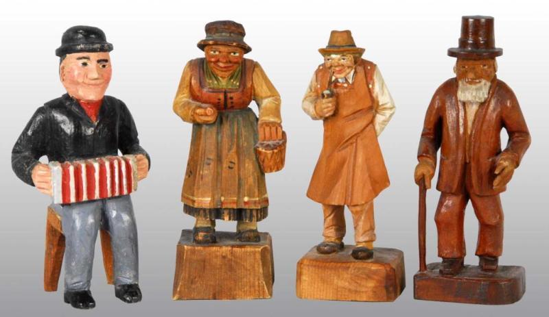 Appraisal: Lot of German Carved Wooden Figures Condition Excellent Size All