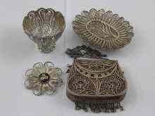 Appraisal: A mixed lot of white metal tests silver filigree comprising