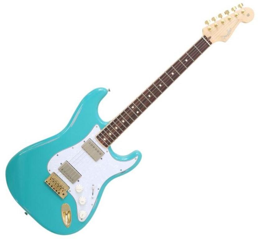 Appraisal: Unusual Partscaster guitar with aqua blue worn finish perloid pickguard