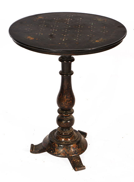 Appraisal: A VICTORIAN CIRCULAR TILT TOP BLACK LACQUERED GAMES TABLE with