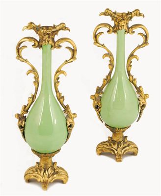 Appraisal: A pair of late th century ormolu mounted ceramic vases