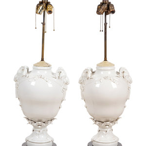 Appraisal: A Pair of German Blanc-de-Chine Porcelain Urns Mounted as Lamps