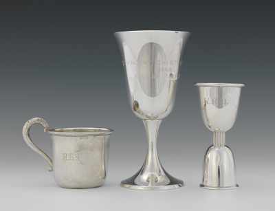 Appraisal: Group of Three Pieces of Engraved Silver The chalice is