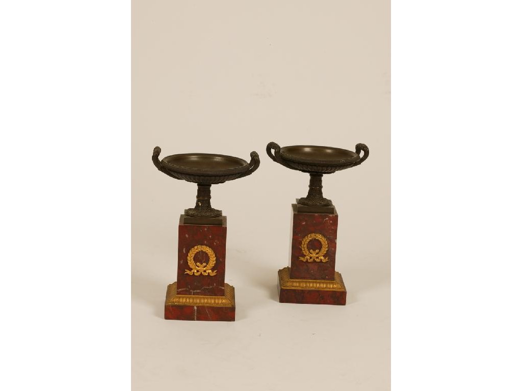 Appraisal: A PAIR OF GRAND TOUR BRONZE TAZZAE each with a