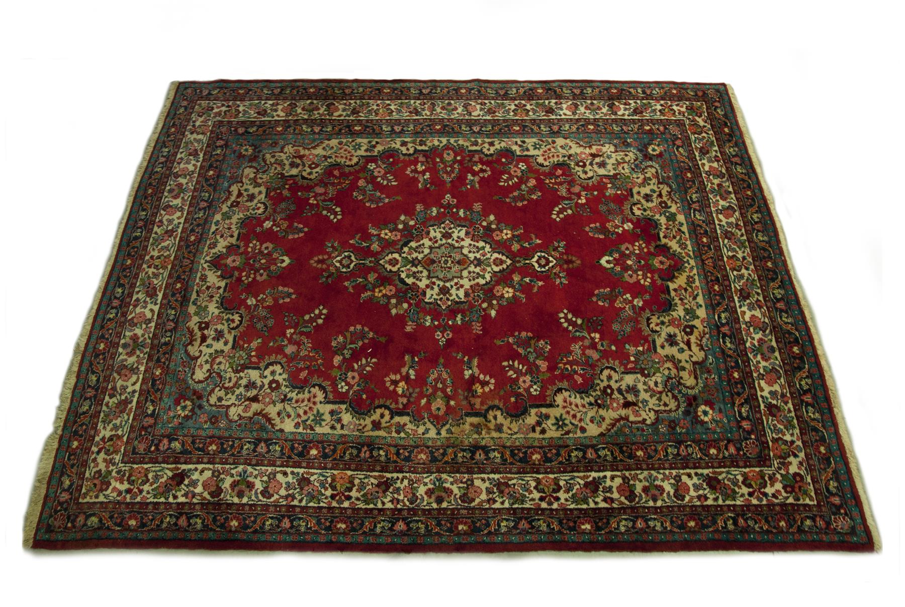 Appraisal: ROOM SIZE ORIENTAL RUG Twentieth century Floral patterns on red