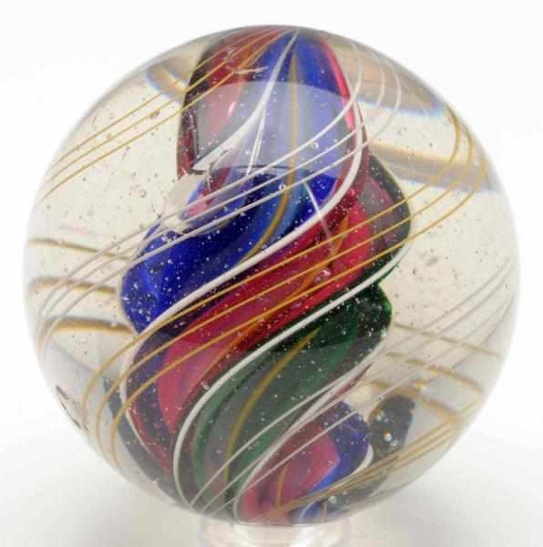 Appraisal: Large Unusual Ridge Core Swirl Marble Nice twist with three