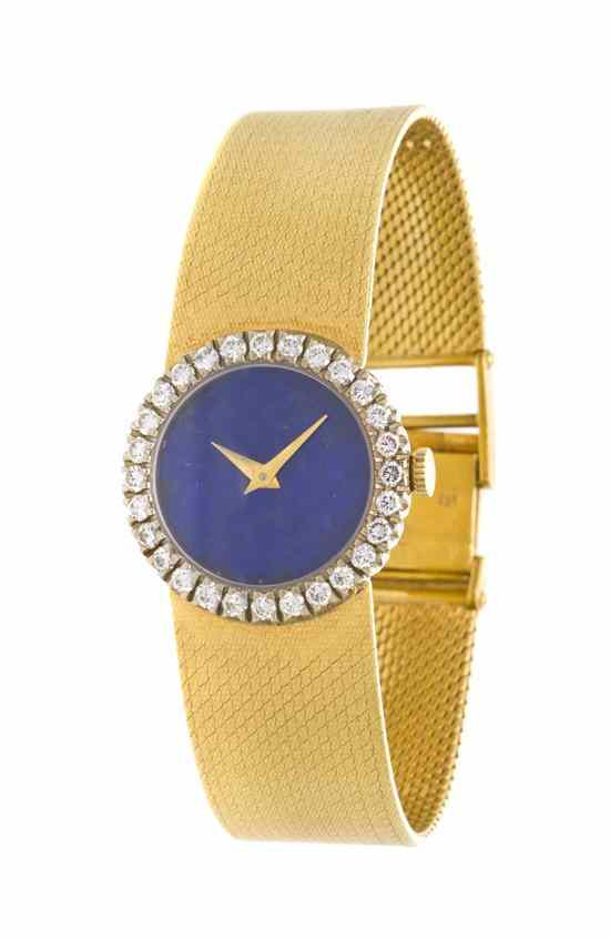 Appraisal: An Karat Yellow Gold Lapis Lazuli and Diamond Wristwatch Baume