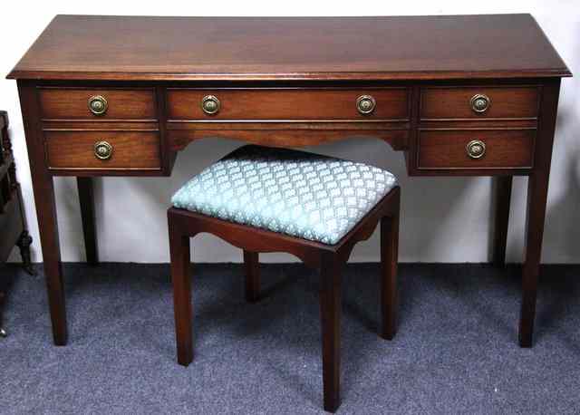 Appraisal: A George III style mahogany dressing table and a George