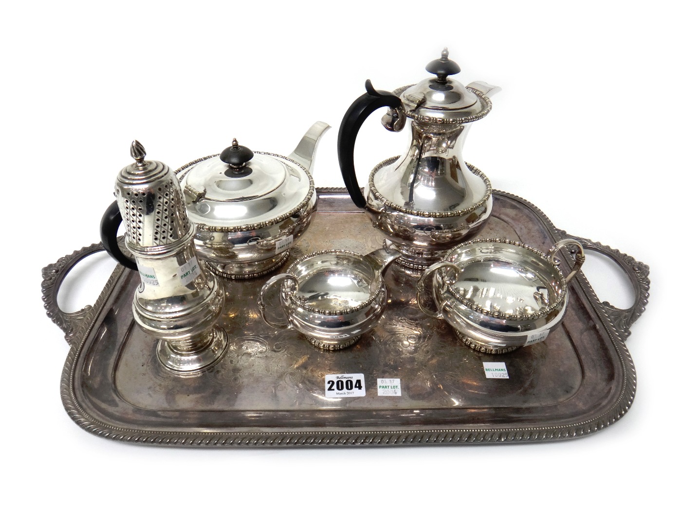 Appraisal: A silver baluster shaped sugar caster London a plated four