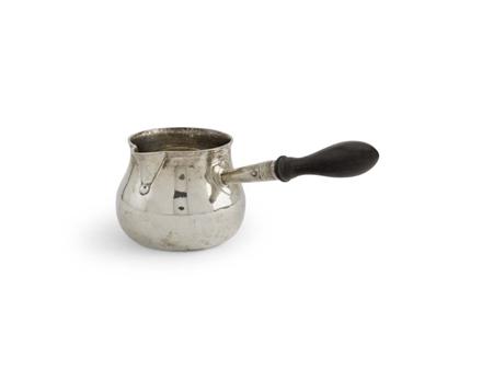 Appraisal: A George III brandy pan JW London of conventional form