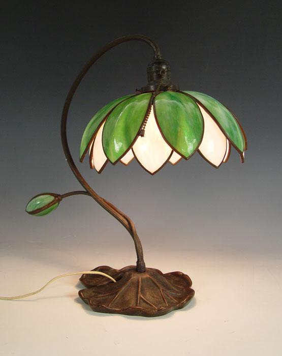 Appraisal: HANDEL BLOSSOMING FLOWER LILY LAMP White and green slag glass