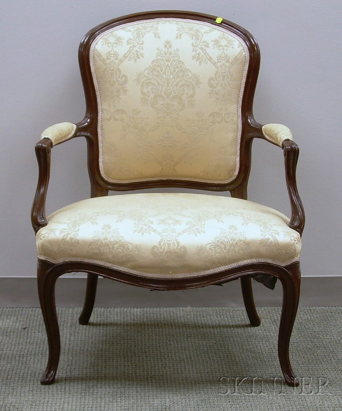 Appraisal: Louis XV Style Damask Upholstered Carved Walnut Armchair