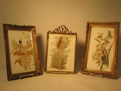 Appraisal: Three gilt framed painted porcelain plaques depicting a draped nude