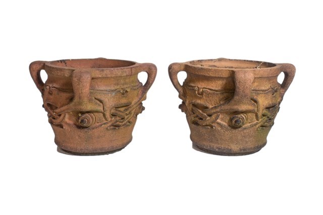 Appraisal: A pair of terracotta 'Olaf' pots after a design by