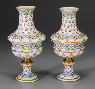 Appraisal: Pair Sevres style urns rose and leaf swags and blue