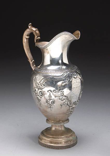 Appraisal: A silver ewer with presentation inscriptionMaker J B retailed by