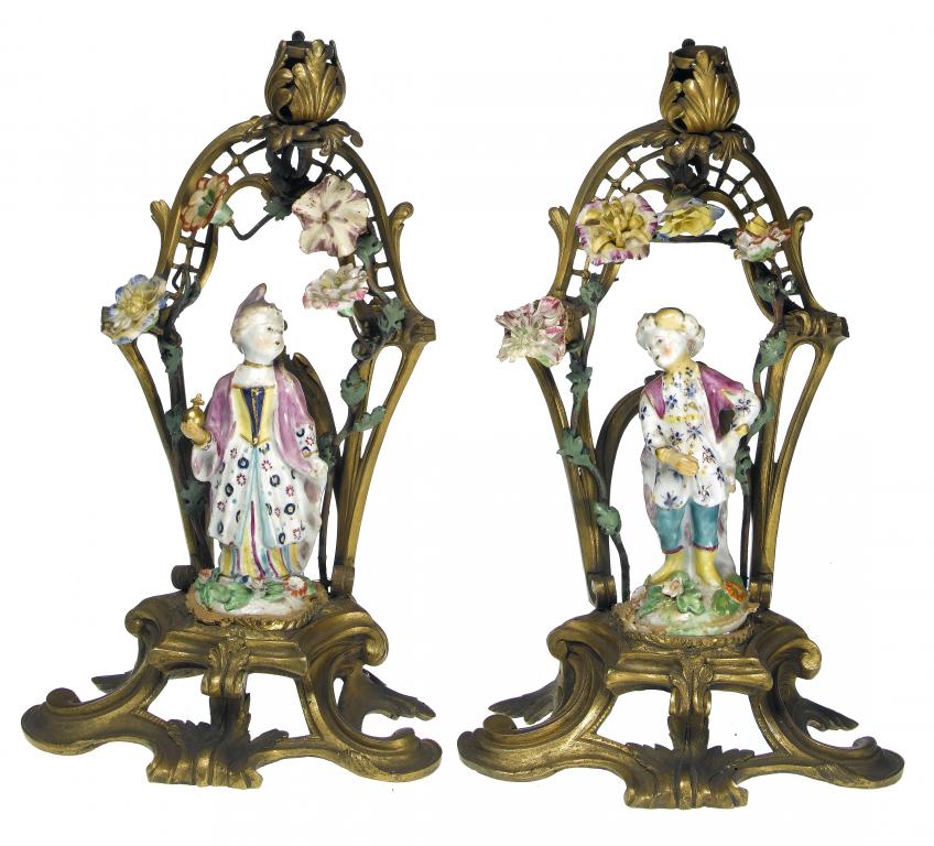 Appraisal: A PAIR OF BOW FIGURES OF A BOY AND GIRL