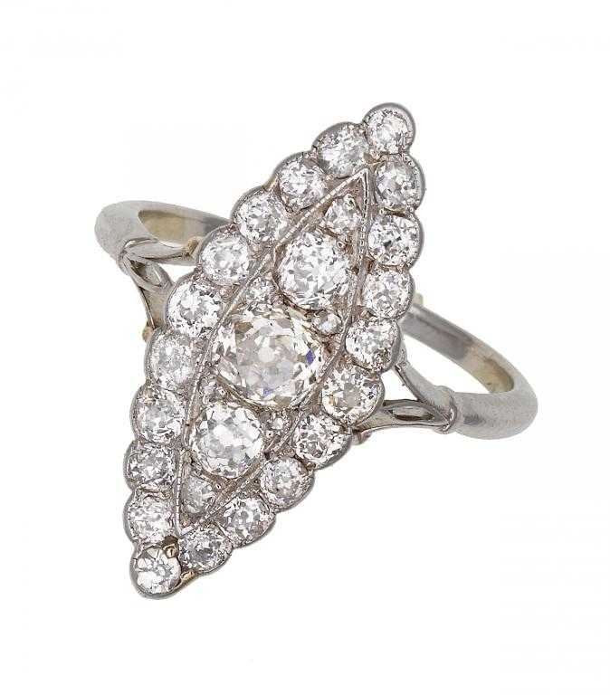 Appraisal: A DIAMOND MARQUISE CLUSTER RING pav set white gold hoop