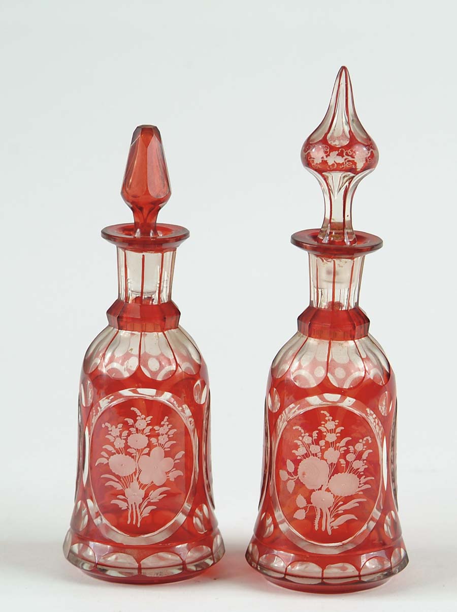 Appraisal: PAIR OF CRANBERRY TO CLEAR BOTTLES Cranberry cut to clear