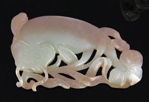 Appraisal: A Chinese jade carving of a catfish on water a