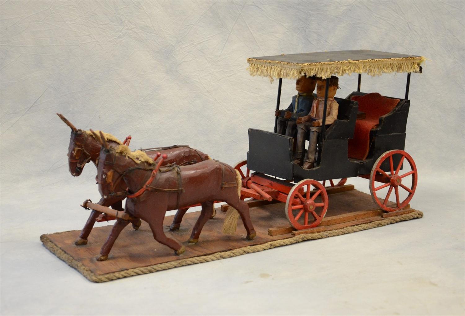 Appraisal: Carved Wooden Surrey with Fringe two seated men and two