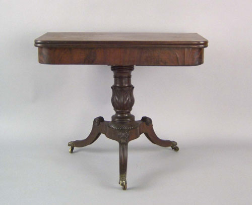 Appraisal: Late Federal mahogany card table ca with a carved standard