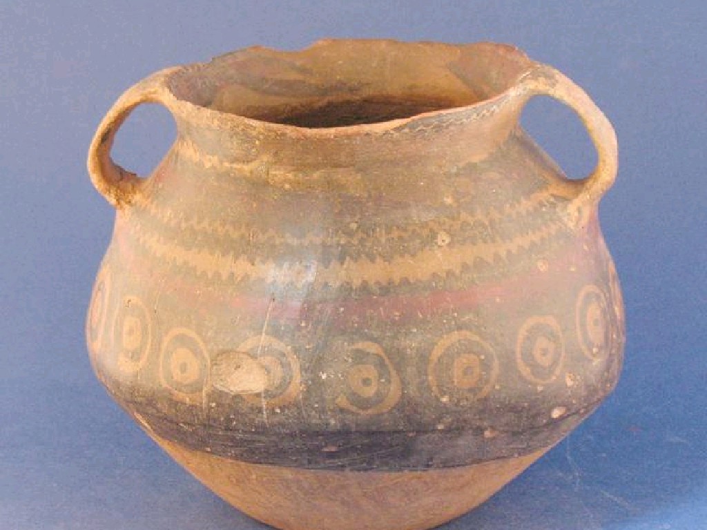 Appraisal: A CHINESE POT with simple loop handles and geometric decoration