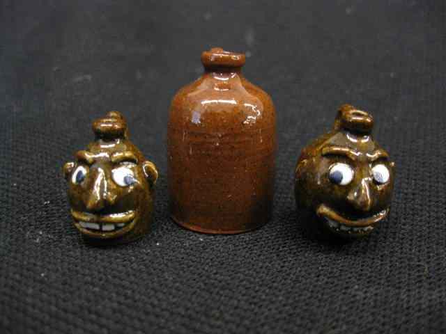 Appraisal: Miniature Pottery Face Jugs Another Jug face jugs are ''