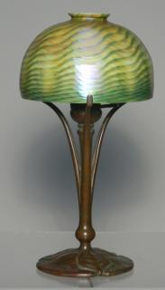 Appraisal: Tiffany studios bronze table lamp with damascene shade Base marked-