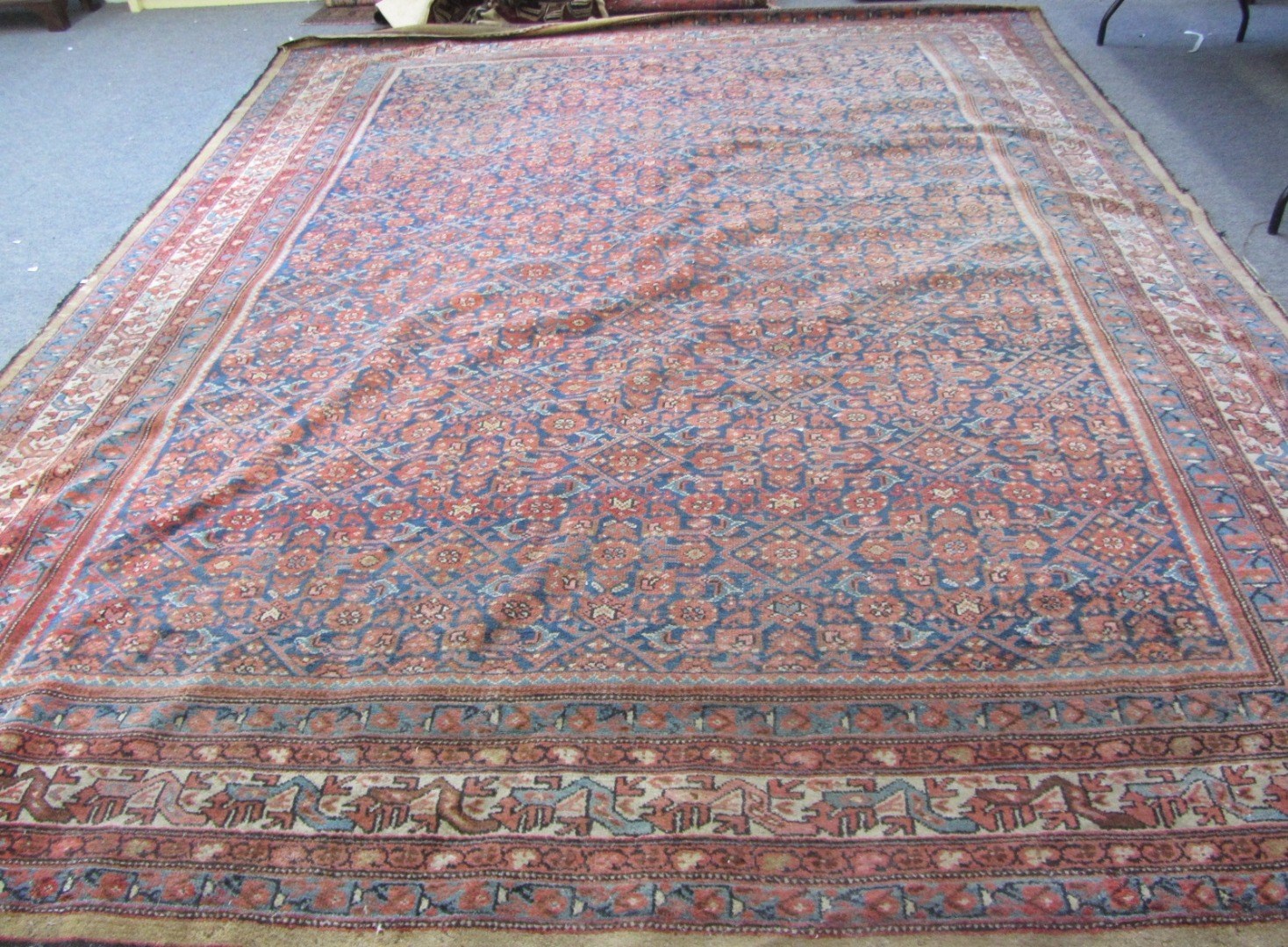 Appraisal: A Fereghan carpet Persian the indigo field with an allover