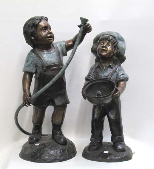 Appraisal: TWO FIGURAL BRONZE SCULPTURAL FOUNTAINS depicting two standing children mounted