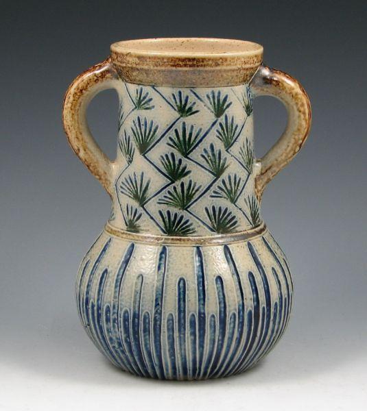 Appraisal: Martin Brothers handled vase with pine needle decoration in typical