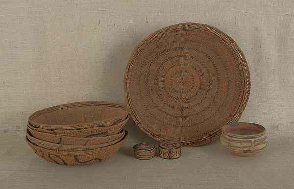 Appraisal: Collection of nine woven baskets together with a southwest pottery