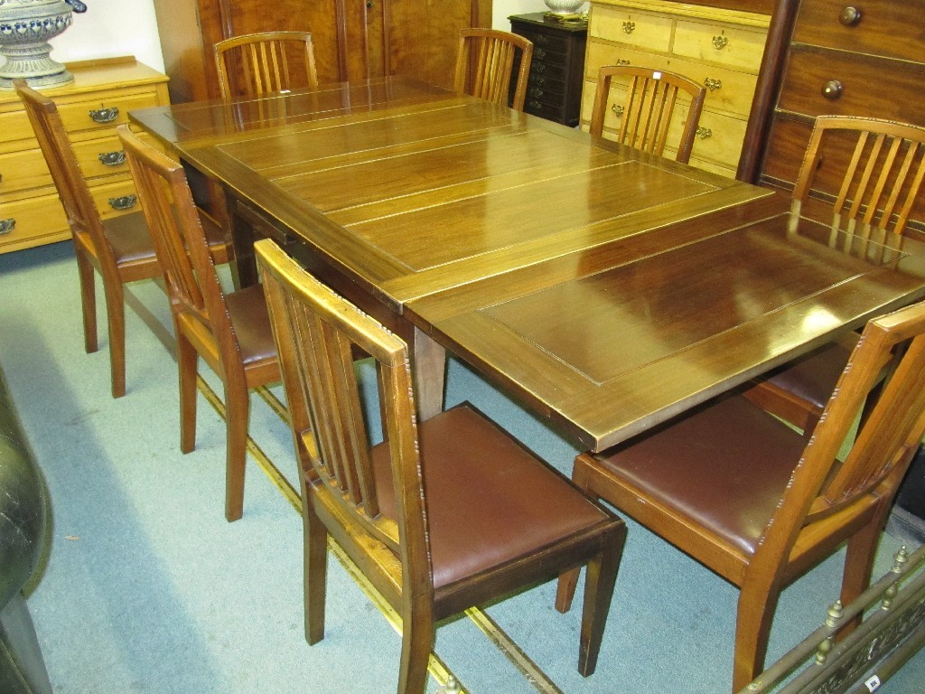 Appraisal: Mahogany pull out dining table with eight mahogany rail back