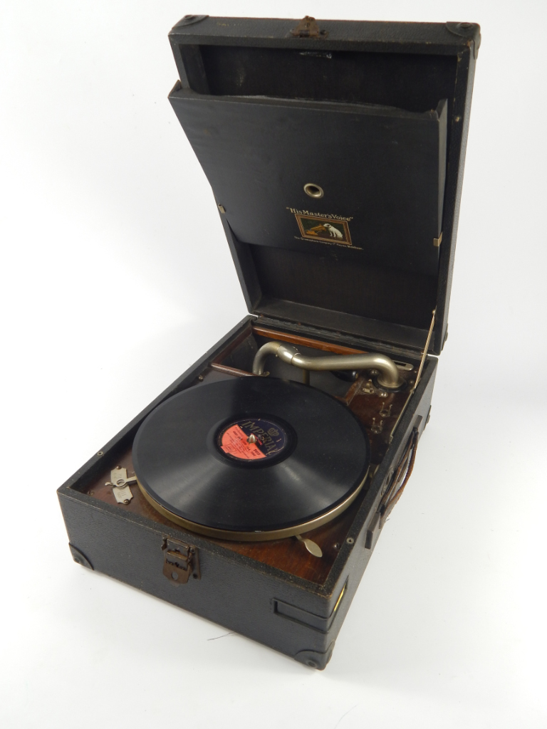 Appraisal: An HMV black cased table top gramophone cm x cm