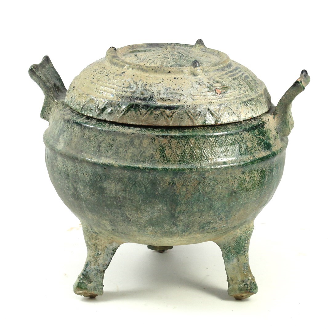 Appraisal: A Chinese green glazed pottery tripod vessel and cover Ding