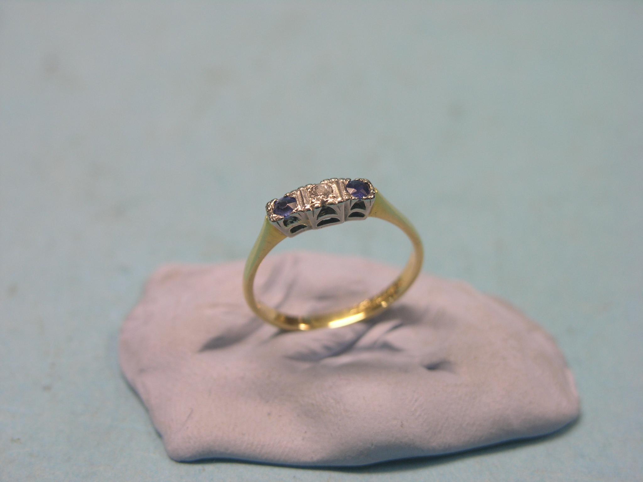 Appraisal: An ct gold half-hoop ring set central diamond and two