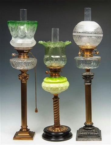 Appraisal: A BRASS CORINTHIAN COLUMN OIL LAMP with lime green tinted