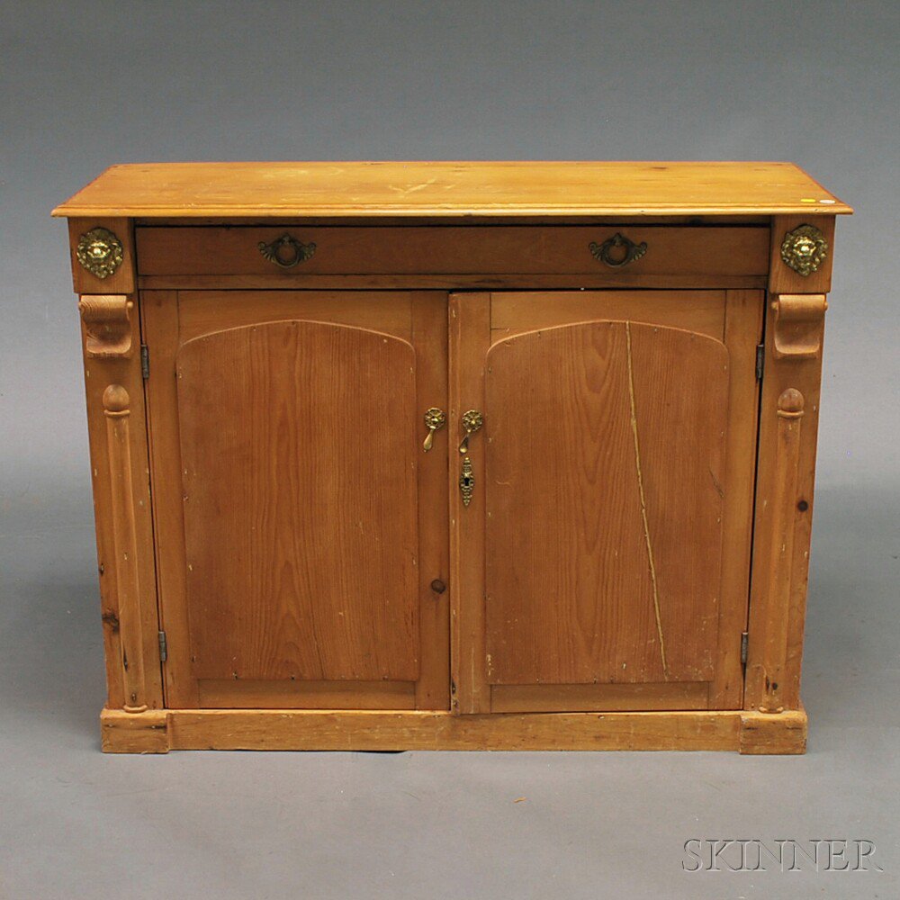 Appraisal: European Neoclassical-style Stripped Pine Credenza the molded rectangular top and