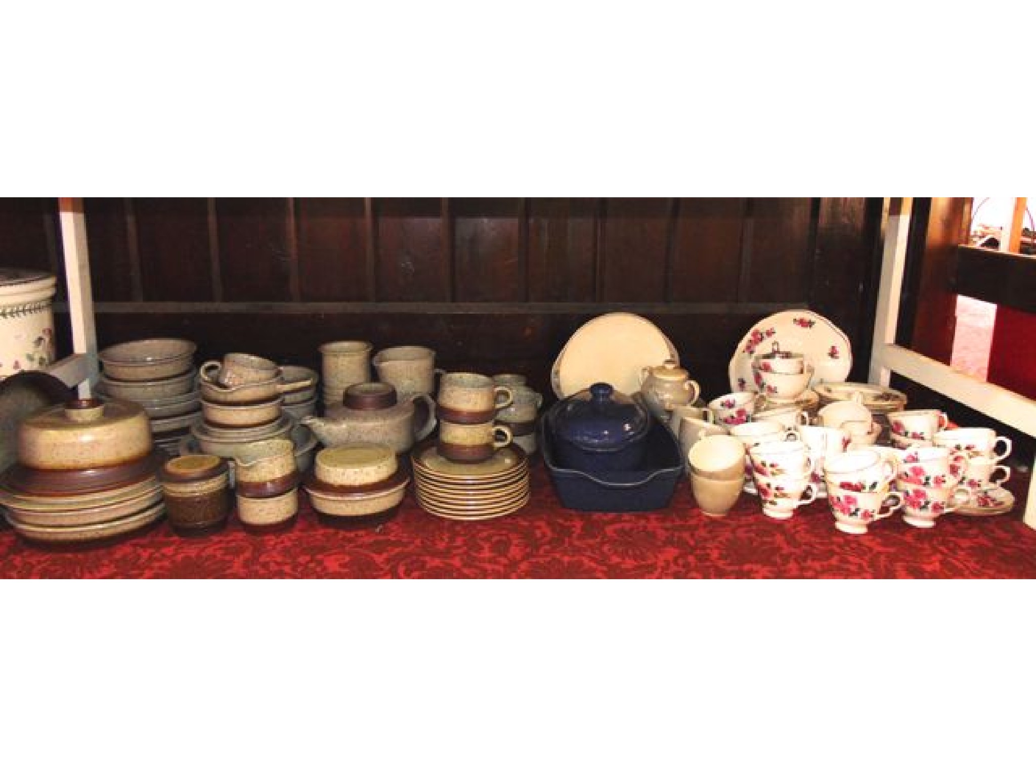 Appraisal: An extensive collection of stoneware dinner and tea wares with