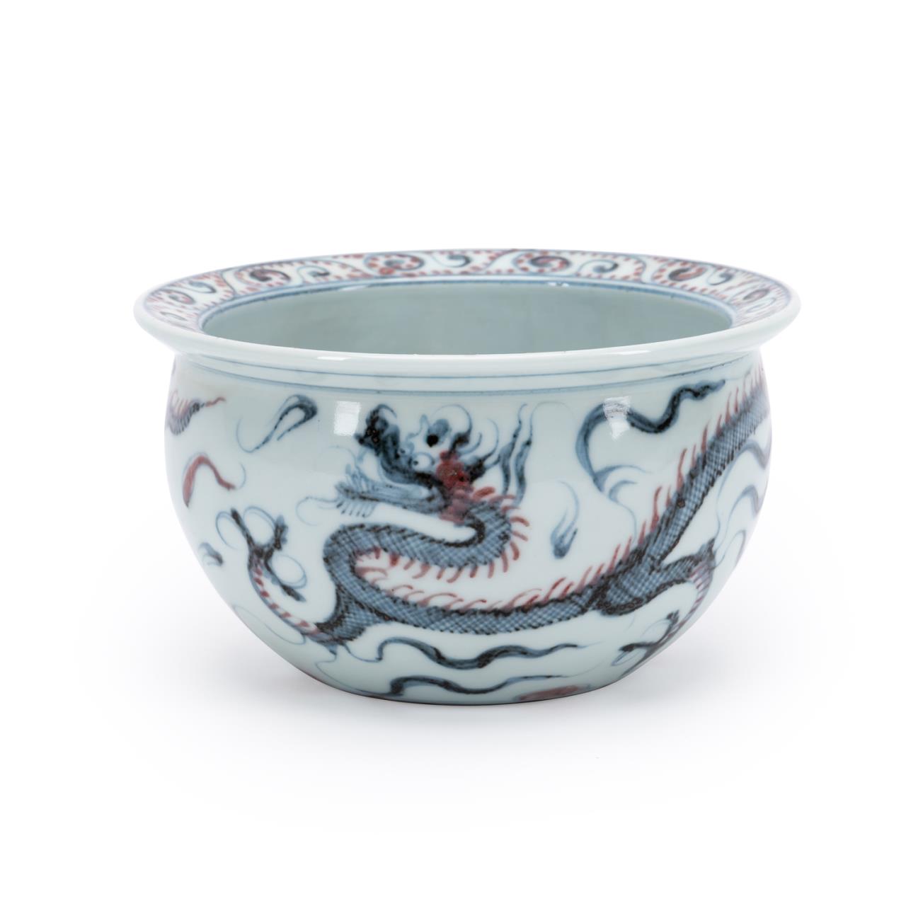 Appraisal: CHINESE BLUE WHITE IRON RED DRAGON BOWL Chinese Ming style