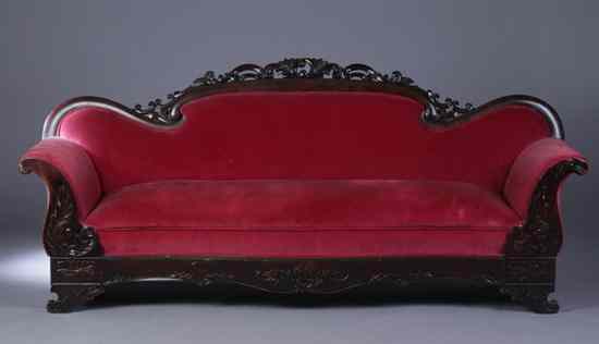 Appraisal: AMERICAN VICTORIAN CARVED MAHOGANY SOFA Late th century Foliate carved