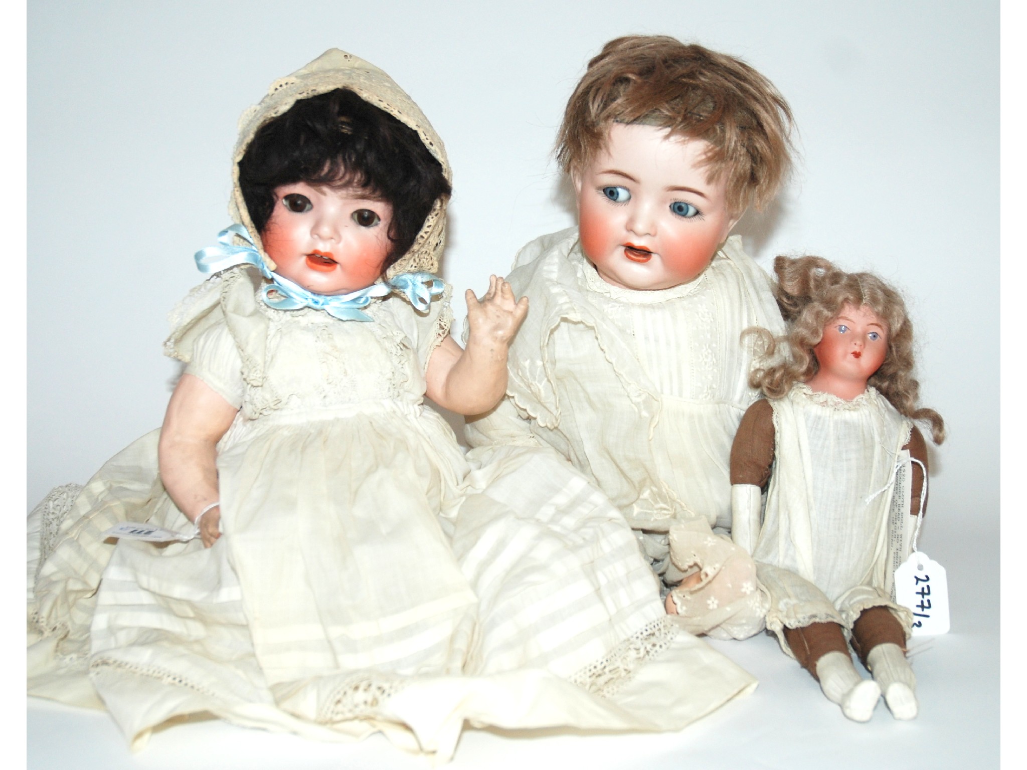 Appraisal: A Schoenau and Hoffmeister bisque-headed dollwith open and close brown