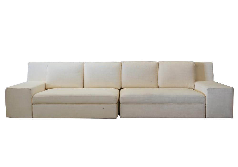 Appraisal: MODERN WHITE LINEN-UPHOLSTERED SECTIONAL SOFAwith two sections and with removable