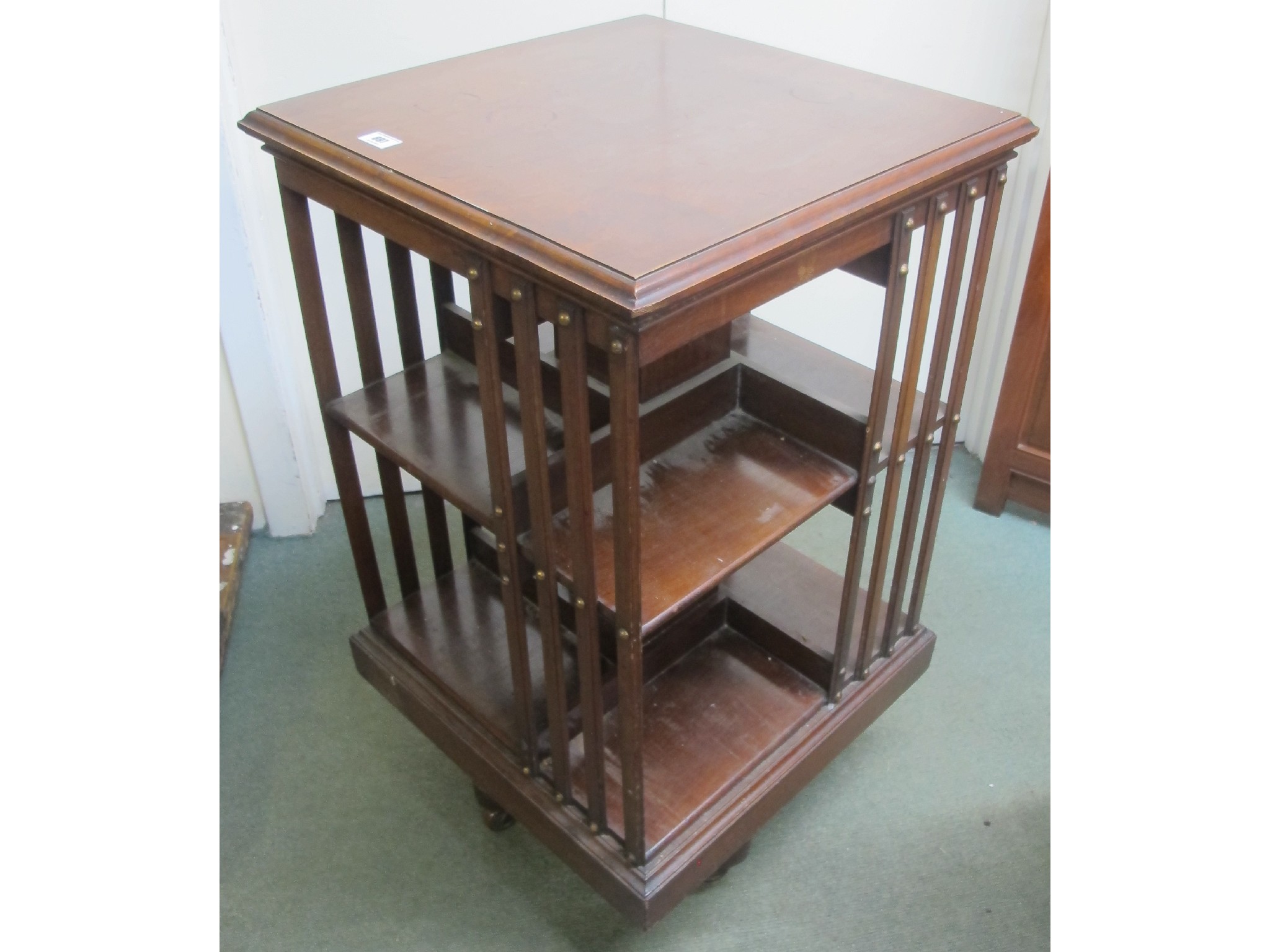 Appraisal: A mahogany revolving bookcase