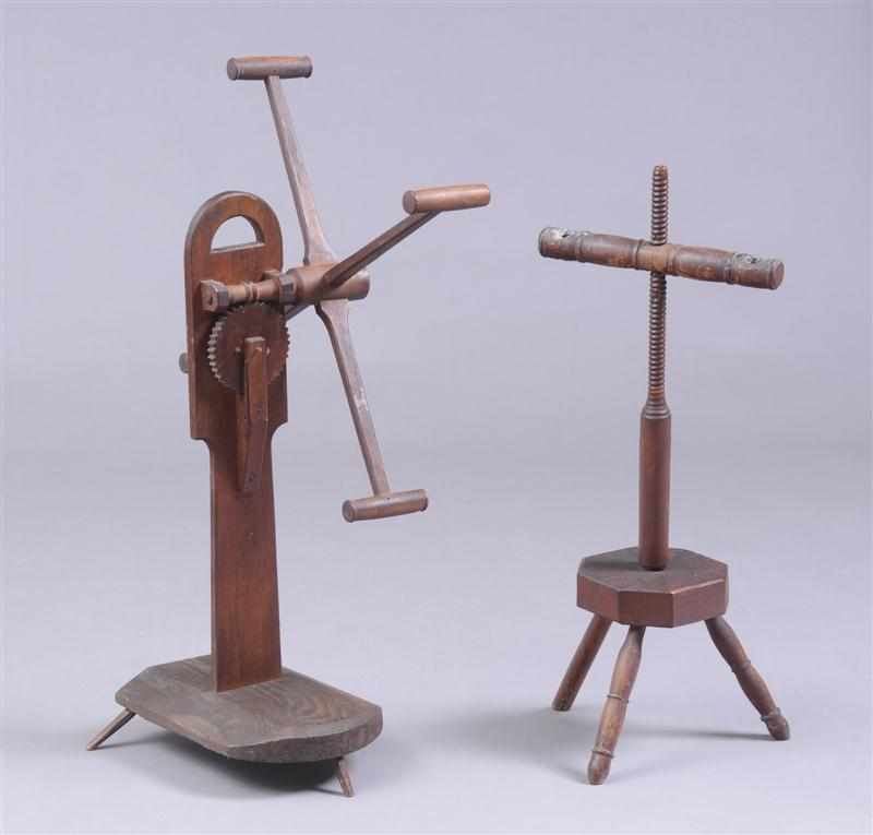 Appraisal: AMERICAN YARN WINDER AND ADJUSTABLE CANDLESTAND The cruciform winder with