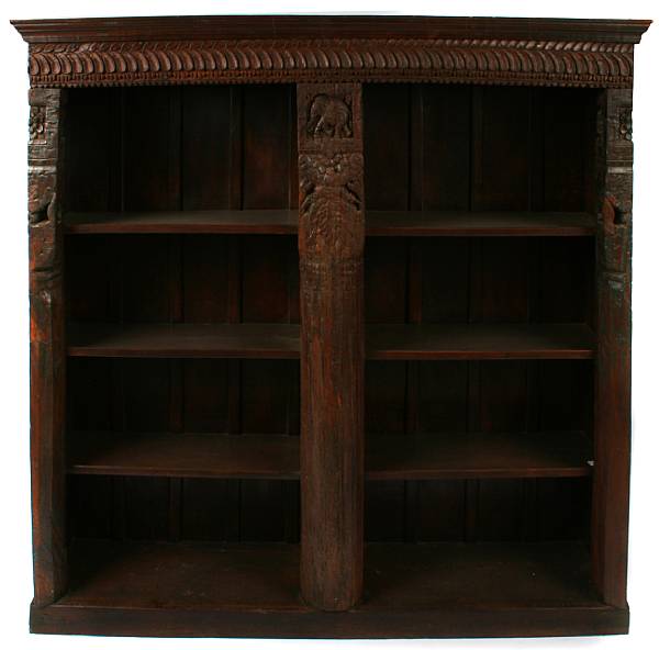 Appraisal: A carved walnut bookcase in the Asian taste height ft