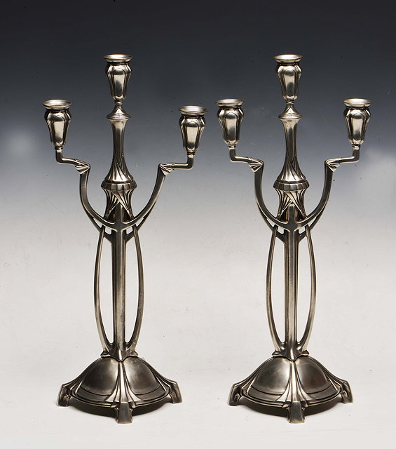 Appraisal: A pair of German Secessionist three branch candelabra stamped factory