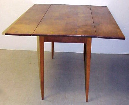 Appraisal: th th C dropleaf table pine tapered legs stains and